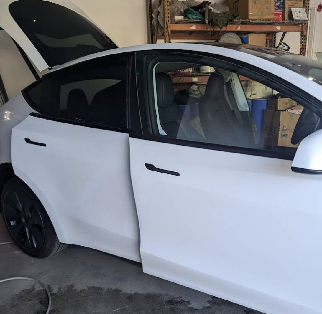 Red Porsche with clear paint protection film